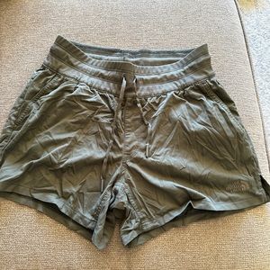 The North Face brand, green lightweight shorts